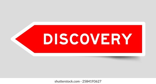 Red color arrow shape sticker label with word discovery on gray background