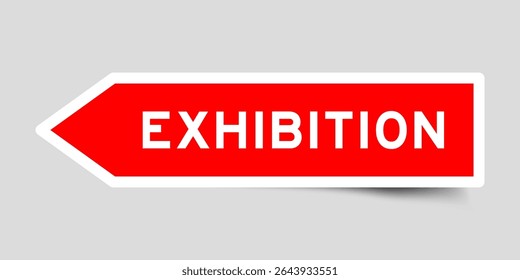 Red color arrow shape sticker label with word exhibition on gray background