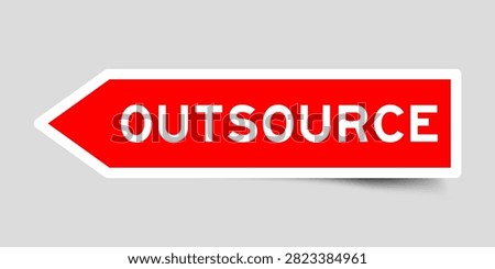 Red color arrow shape sticker label with word outsource on gray background