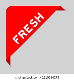 Red color of corner label banner with word fresh on gray background