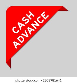 Red color of corner label banner with word cash advance on gray background