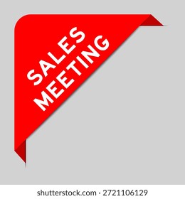 Red color of corner label banner with word sales meeting on gray background