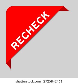 Red color of corner label banner with word recheck on gray background