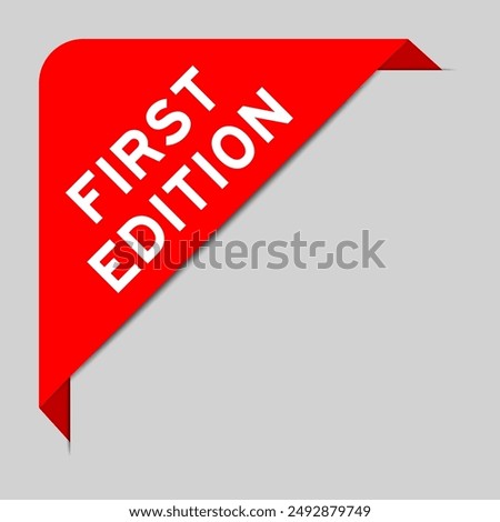 Red color of corner label banner with word first edition on gray background