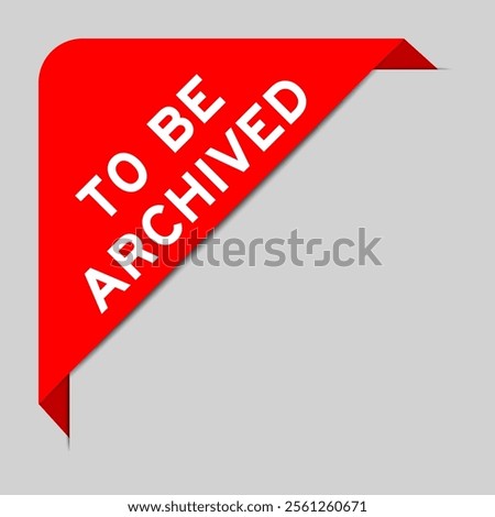 Red color of corner label banner with word to be archived on gray background