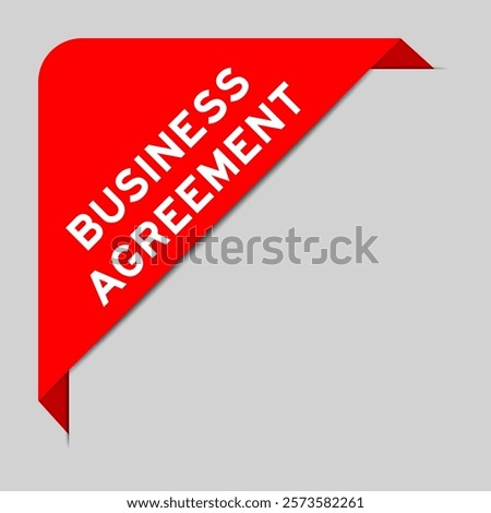 Red color of corner label banner with word business agreement on gray background