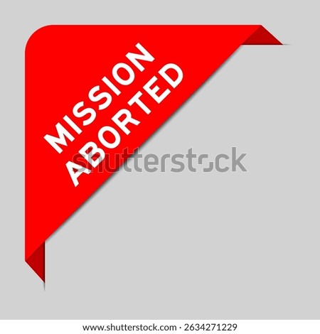 Red color of corner label banner with word mission aborted on gray background