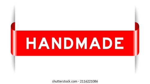 Red color inserted label banner with word handmade on white background