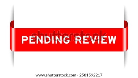 Red color inserted label banner with word pending review on white background