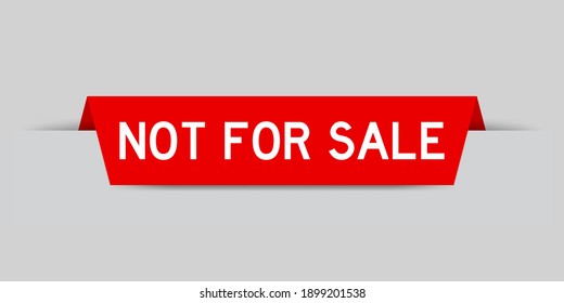 Red color inserted label with word not for sale on gray background