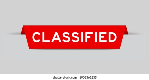 Red color inserted label with word classified on gray background