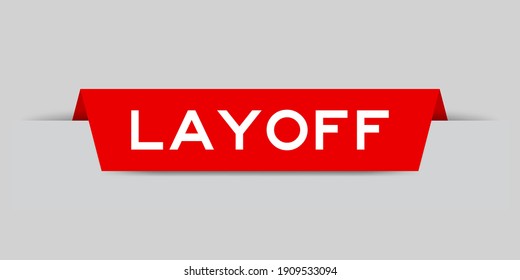 Red color inserted label with word layoff on gray background