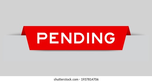 Red color inserted label with word pending on gray background