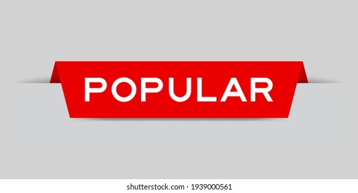 Red color inserted label with word popular on gray background