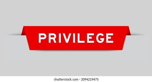 Red color inserted label with word privilege on gray background