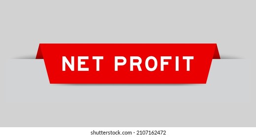 Red color inserted label with word net profit on gray background