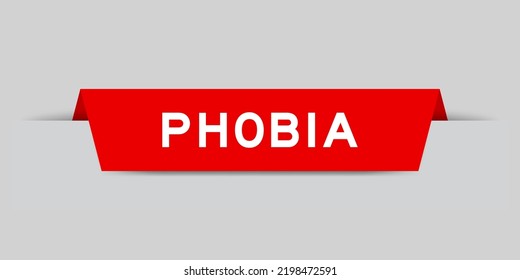 Red color inserted label with word phobia on gray background