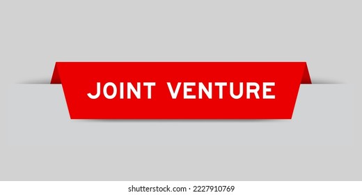 Red color inserted label with word joint venture on gray background