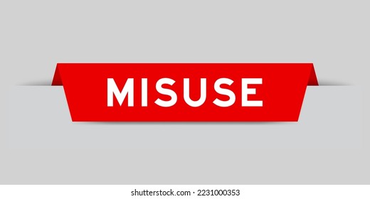 Red color inserted label with word misuse on gray background