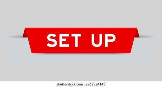 Red color inserted label with word set up on gray background