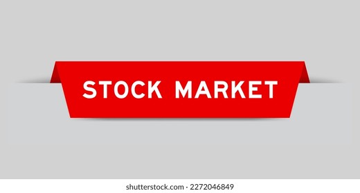 Red color inserted label with word stock market on gray background