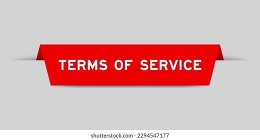 Red color inserted label with word terms of service on gray background