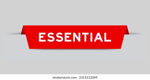 Red color inserted label with word essential on gray background