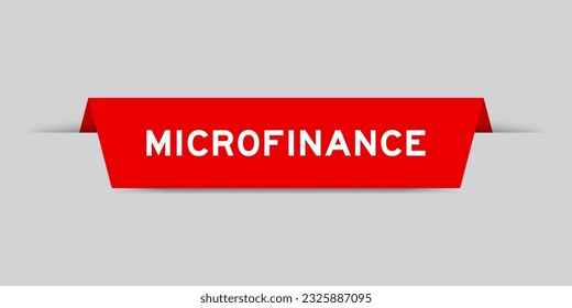 Red color inserted label with word microfinance on gray background