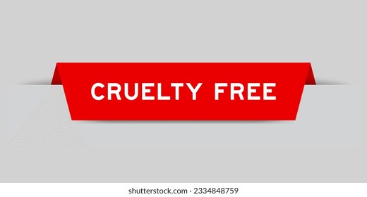 Red color inserted label with word cruelty free on gray background