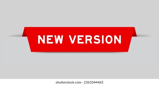 Red color inserted label with word new version on gray background