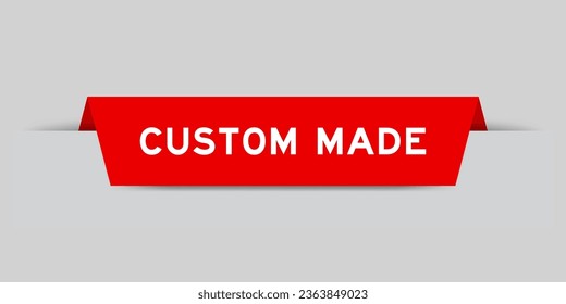 Red color inserted label with word custom made on gray background