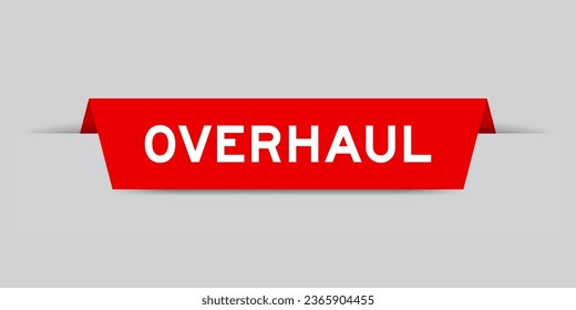 Red color inserted label with word overhaul on gray background
