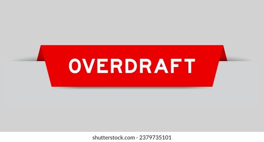 Red color inserted label with word overdraft on gray background
