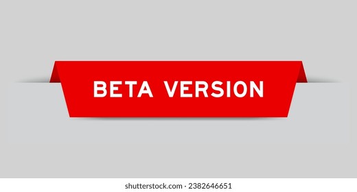 Red color inserted label with word beta version on gray background