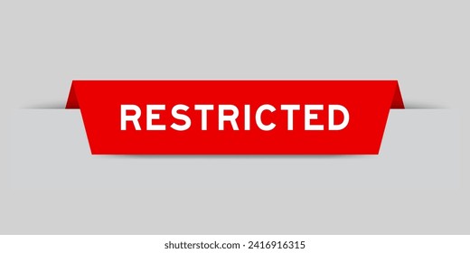 Red color inserted label with word restricted on gray background