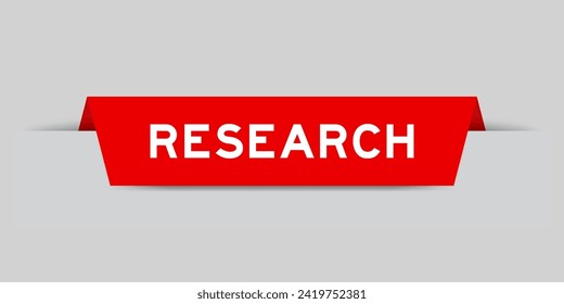 Red color inserted label with word research on gray background