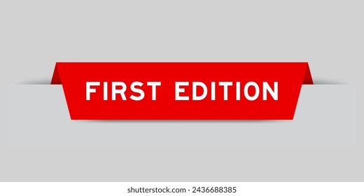 Etiqueta de color rojo insertada con la primera edición de la palabra sobre fondo gris