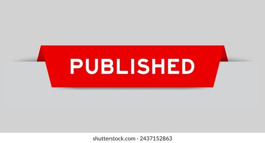 Red color inserted label with word published on gray background
