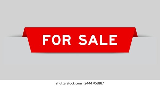 Red color inserted label with word for sale on gray background