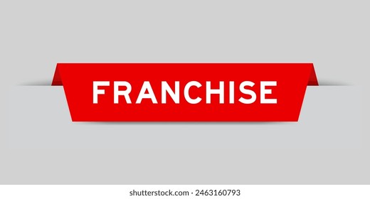 Red color inserted label with word franchise on gray background