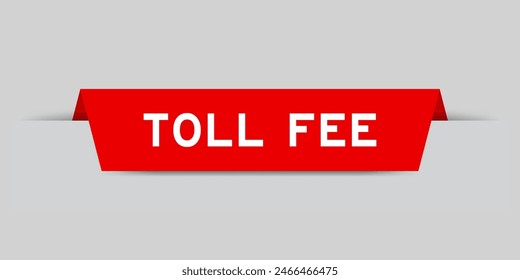 Red color inserted label with word toll fee on gray background