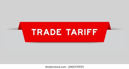 Red color inserted label with word trade tariff on gray background
