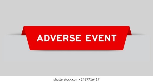 Red color inserted label with word adverse event on gray background