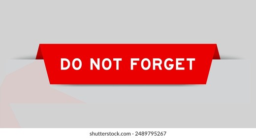Red color inserted label with word do not forget on gray background