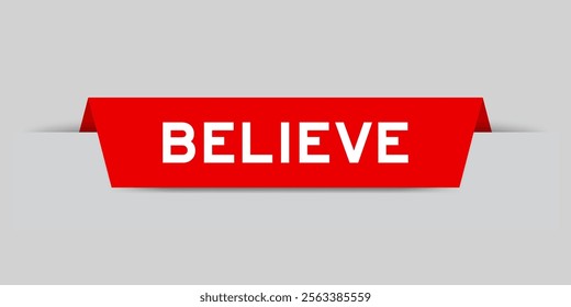 Red color inserted label with word believe on gray background