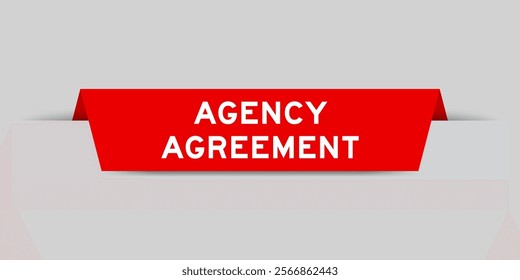 Red color inserted label with word agency agreement on gray background