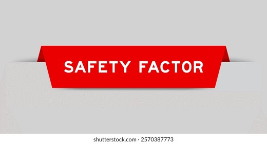 Red color inserted label with word safety factor on gray background