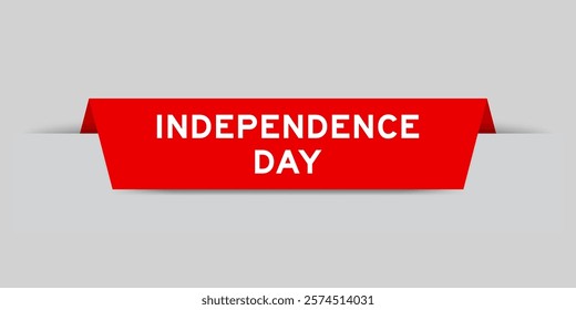 Red color inserted label with word independence day on gray background