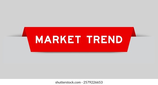 Red color inserted label with word market trend on gray background