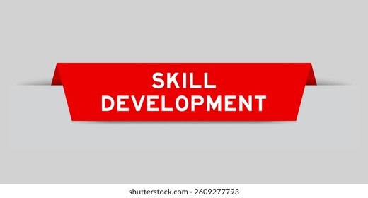 Red color inserted label with word sill development on gray background